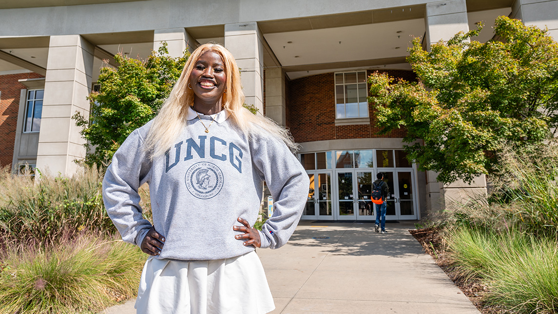 UNCG SGA president Awa Mbai stands in front of the EUC