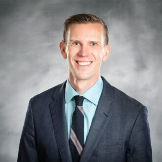 headshot of Ryan Hughes