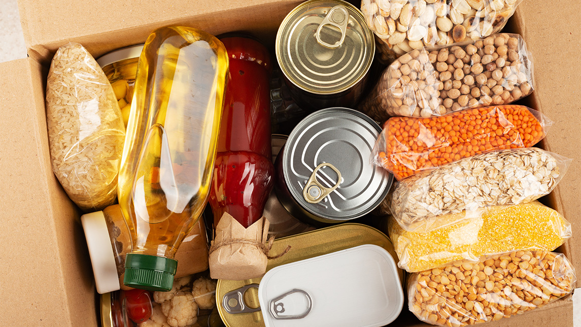 Box full of canned food.