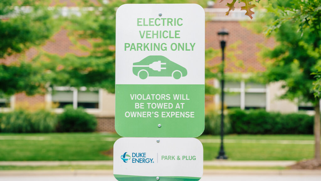 Park and Plug Parking Sign at UNCG