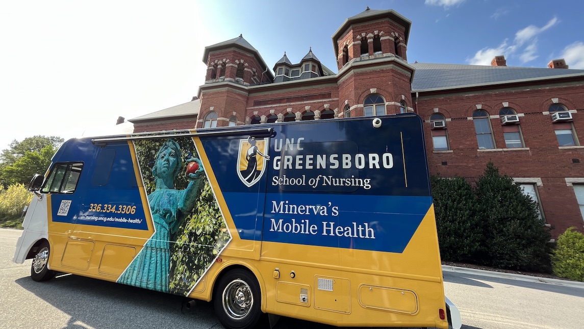 Minvera's mobile health mobile in front of UNCG campus.