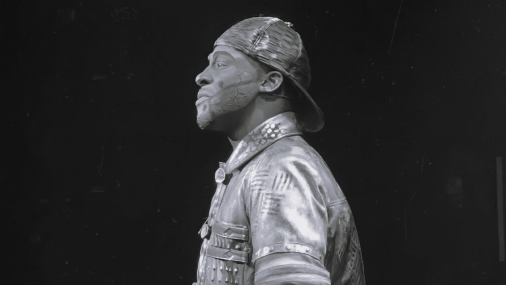 UNCG student Avilon Tate in costume as the tin man in "The Wiz"