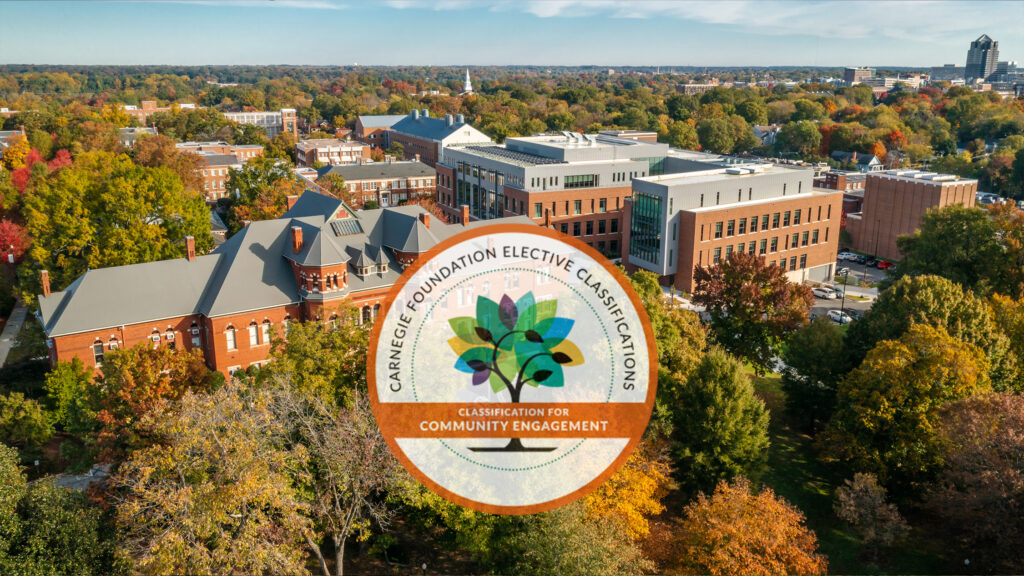 UNCG campus with Carnegie Classification logo