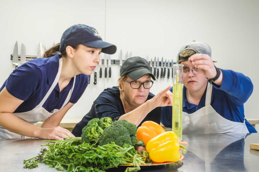 three women in a nutrition lab
