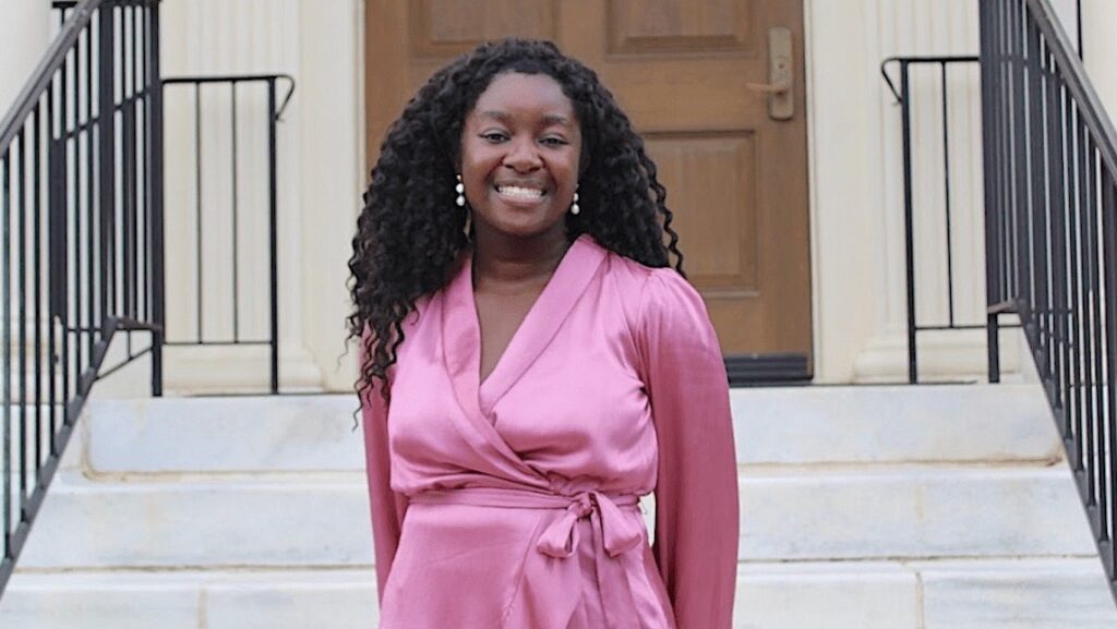 BSBE student Jadyn Koranteng poses on the steps of UNCG.