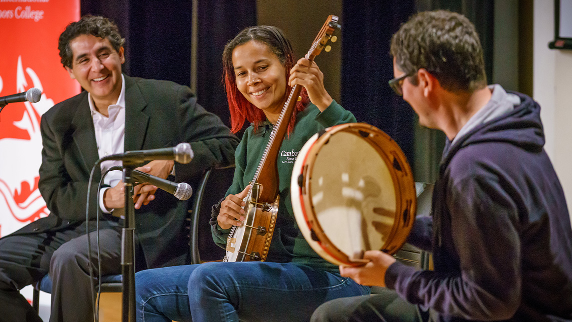 Rhiannon Giddens plays banjo