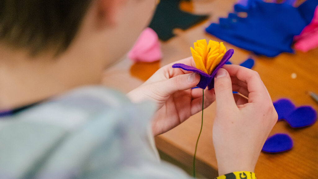 Building a felt flower.