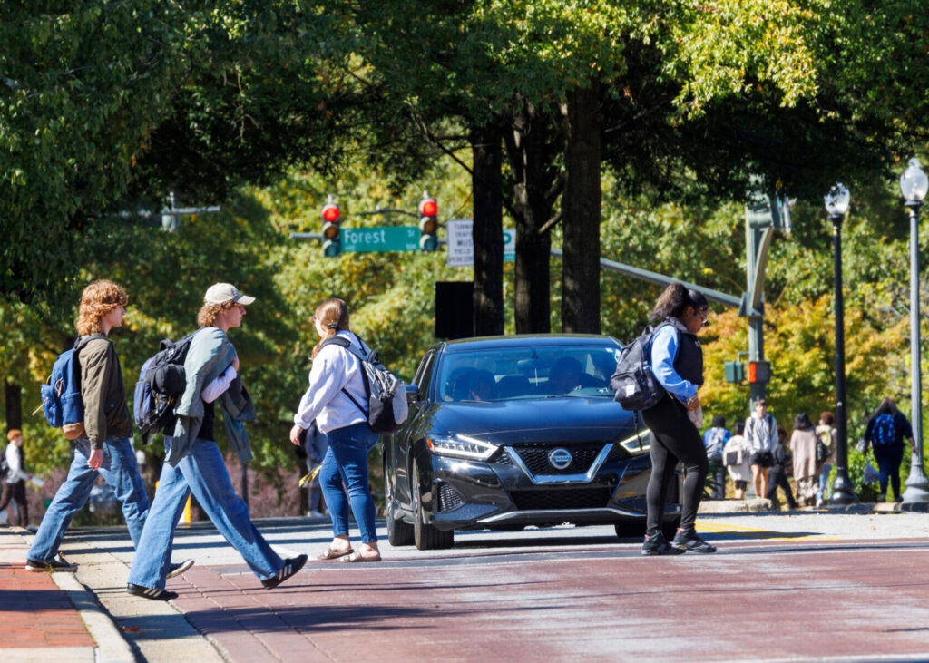 Busy street on UNCG campus in 2023.