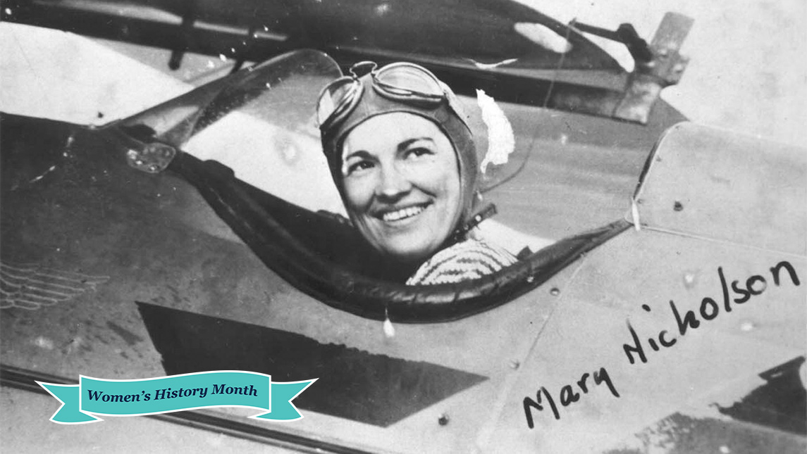 Mary Webb Nicholson in the cockpit of a plane.