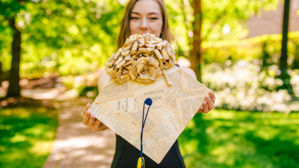 Hannah Ward shows her decorated graduation cap
