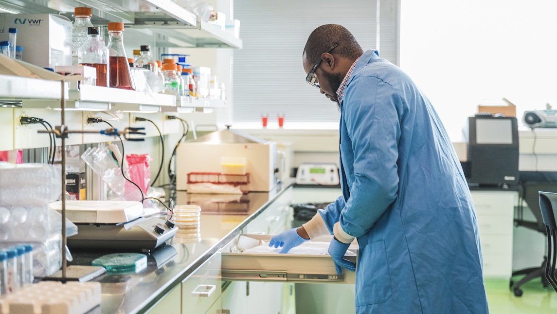 Eric Laws working in the lab at UNCG JSNN school.