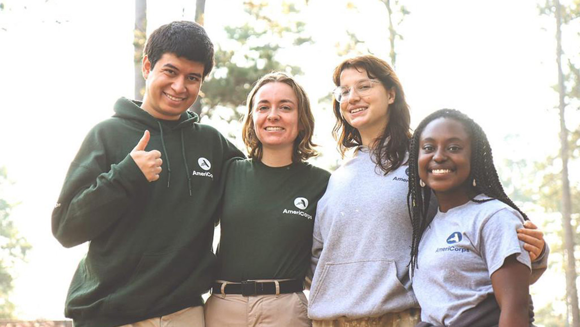 Four young people working for Americorps.