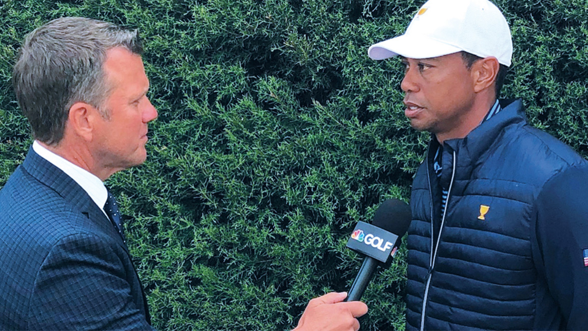 UNCG alum Todd Lewis interviews Tiger Woods.