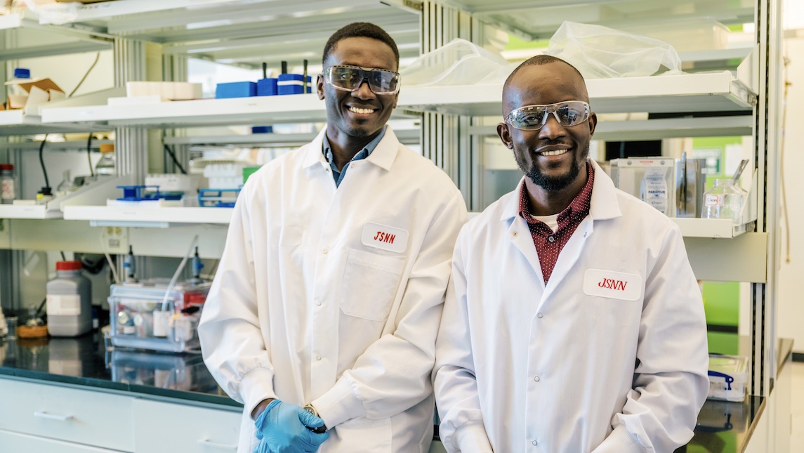 Two JSNN students take time for photo in the UNCG lab.