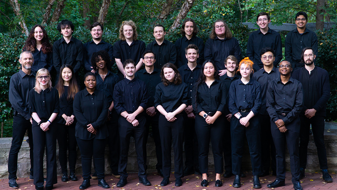 Dr. Eric Willie in a group shot with the UNCG Percussion Ensemble.