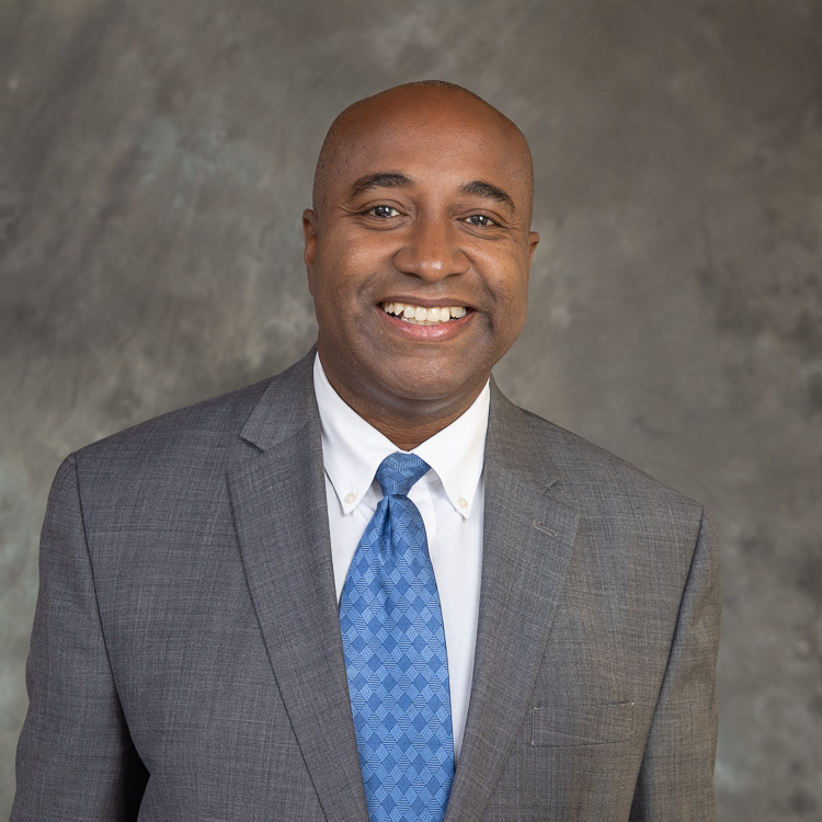 headshot of Brian Clarida