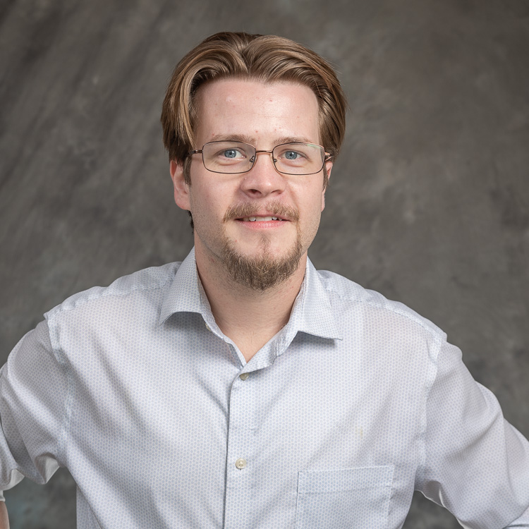 headshot of Chris Auman