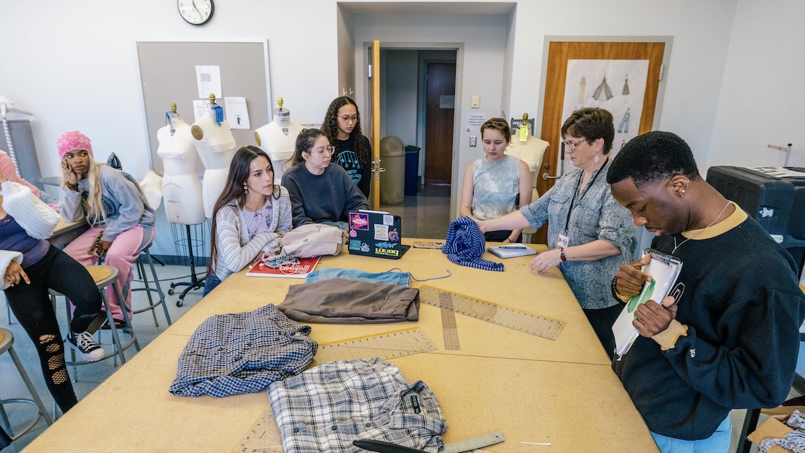 Design students work on adaptive apparel for people with disabilities.