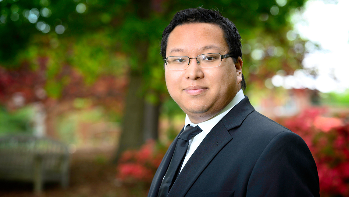 Jimmy Vang wearing a suit and tie.