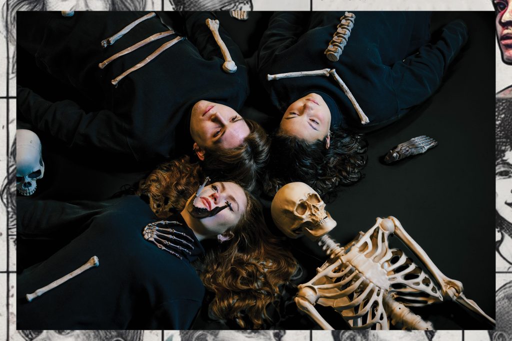 Everybody image for event. people in a circle laying down with a skeleton