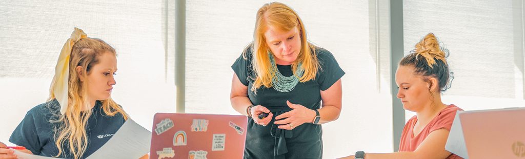 Dr. Julie Bost works with students to prepare IEPs