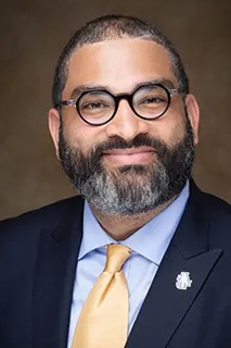 Portrait of Dr. Oliver M. Thomas.