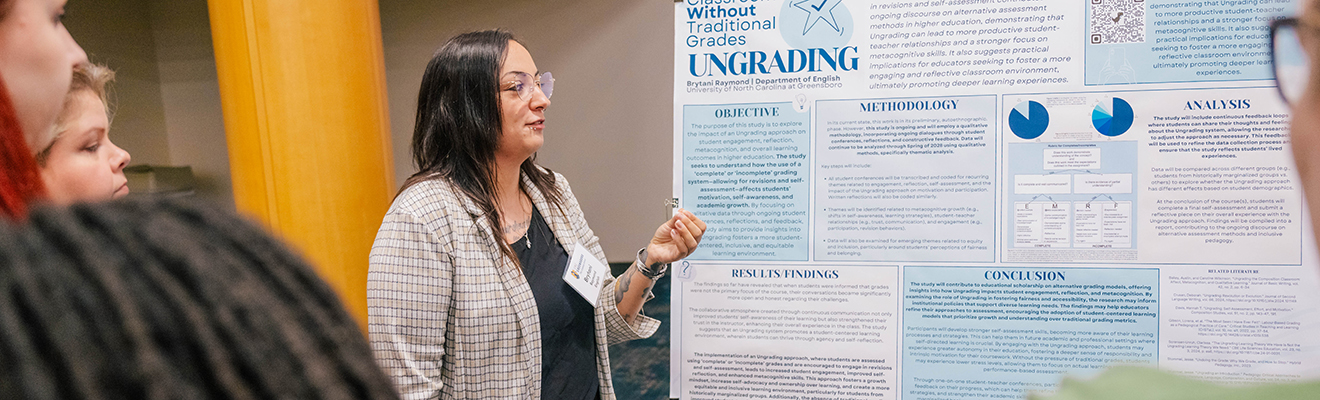 A presenter stands beside a large research poster during a graduate research showcase, speaking to a small group of attendees. The poster includes sections titled Objective, Methodology, Analysis, Results/Findings, and Conclusion, along with charts and diagrams. Audience members are visible in the foreground, and the indoor conference setting features warm lighting and display boards for academic research presentations.