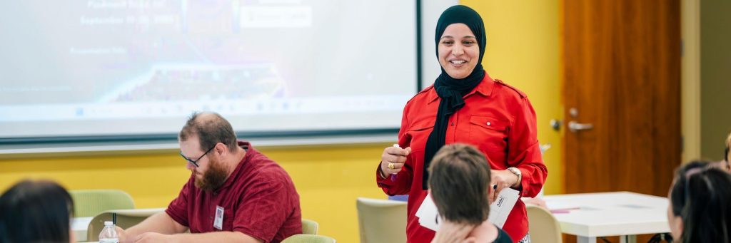 Instructor presenting to students in a classroom