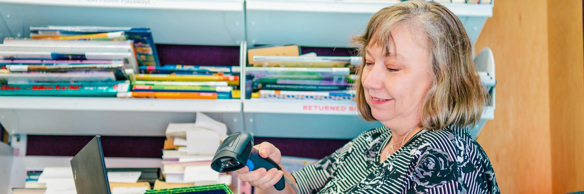 adult woman in a library setting