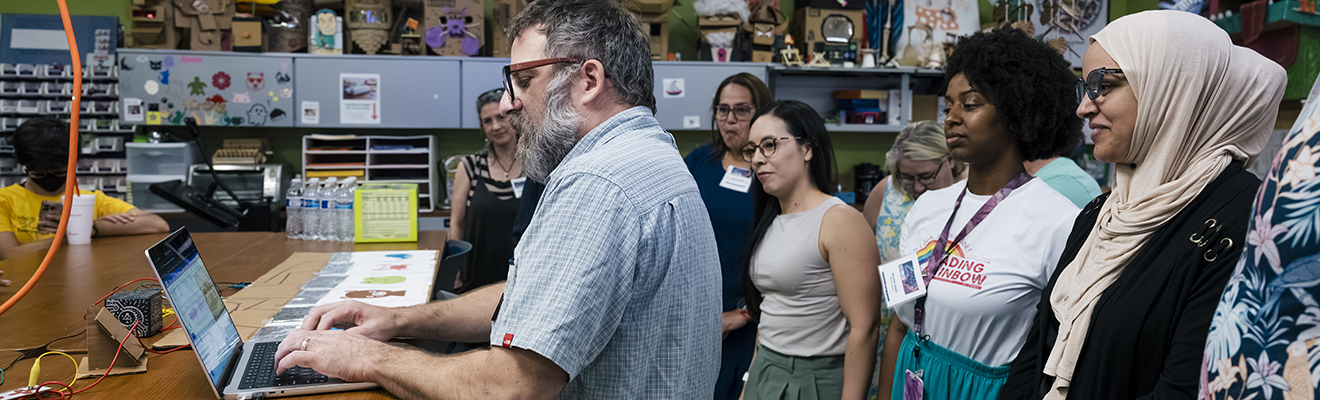 Educators work in a makerspace