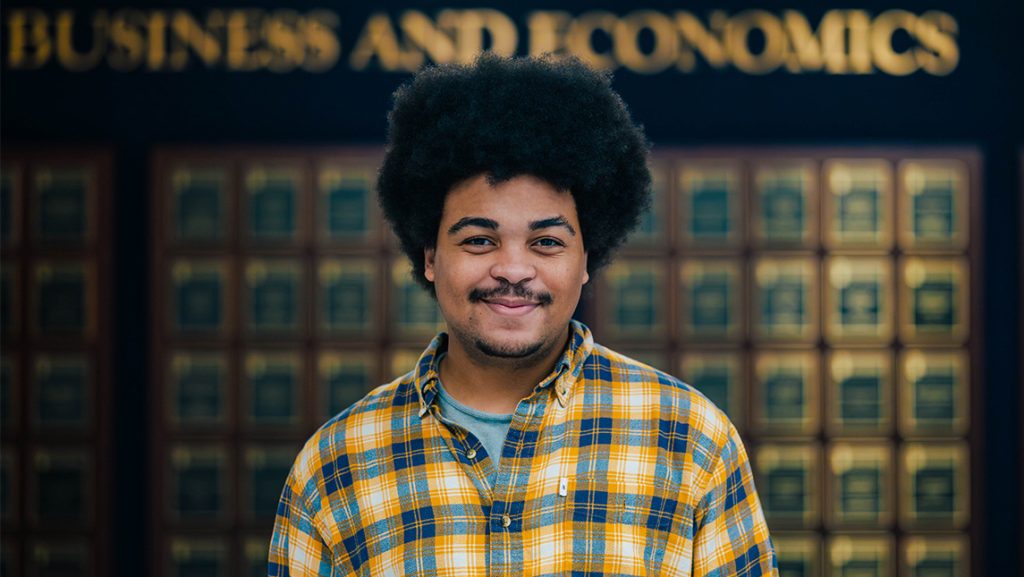 UNCG student Taylee Gaillard inside the Bryan School of Business and Economics.