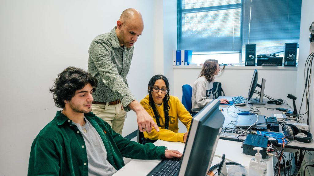 Dr. Robert Wiley coaches his students.