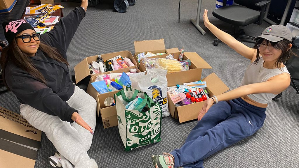 Members preparing donation packages.
