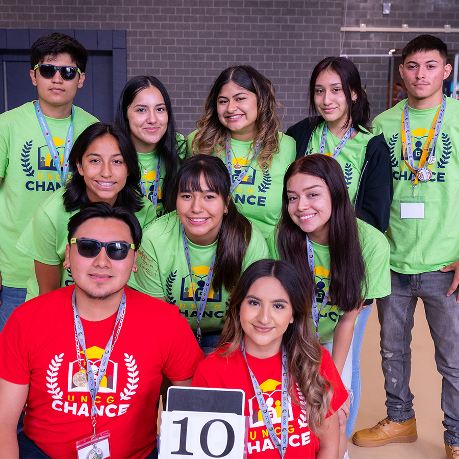 Students pose in their UNCG CHANCE Camp t-shirts.