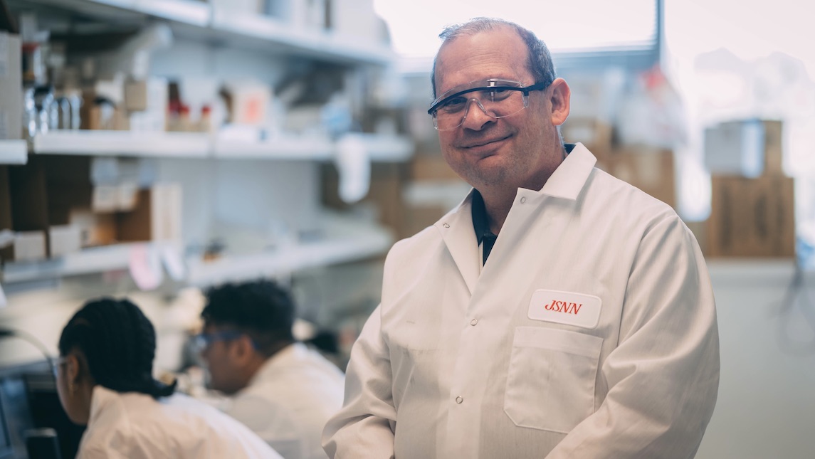 JSNN's Daniel Rabinovich takes a moment to pose for a pic in the lab.