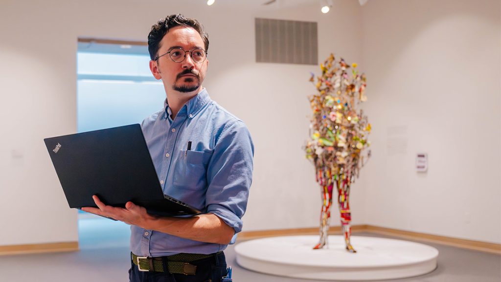 UNCG's Dr. John Borchert looks around a museum gallery.