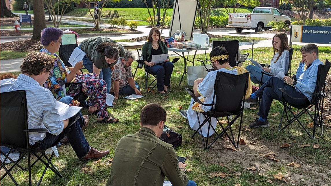 Students and faculty reading Plato's Republic at UNCG.