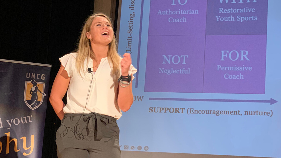 A UNCG student gives a presentation.
