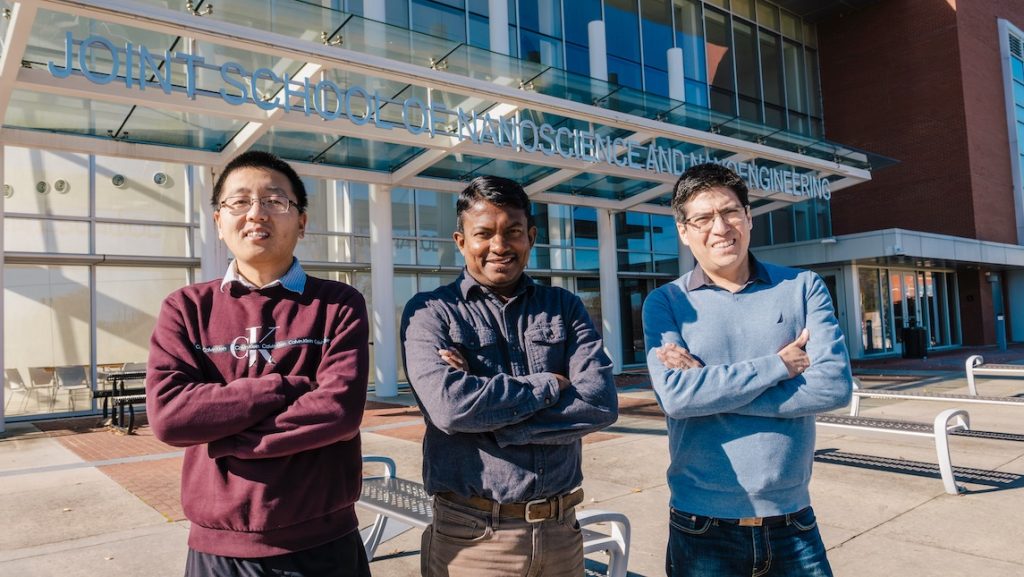 Three new Nanoscience faculty: Dr. Oscar Avalos Ovando, Dr. Sampath Gamage, and Dr. Tianqi Song stand outside of the JSNN building.
