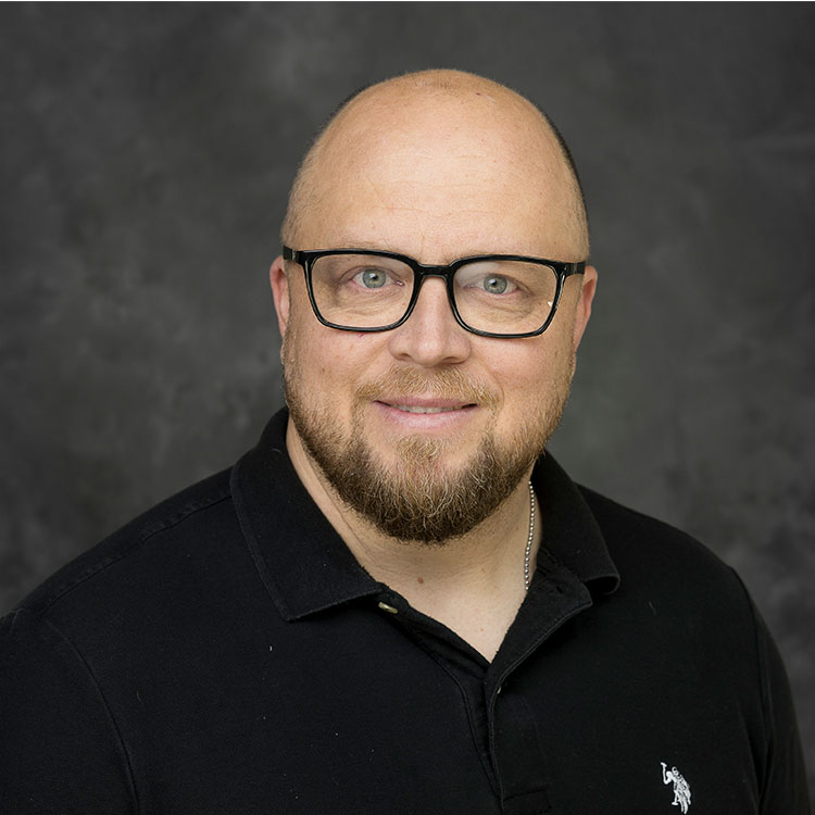 Headshot of Aaron Beveridge