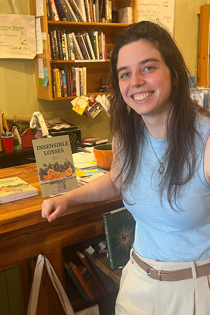 UNCG alumna Dr. Joey Lew with her book.