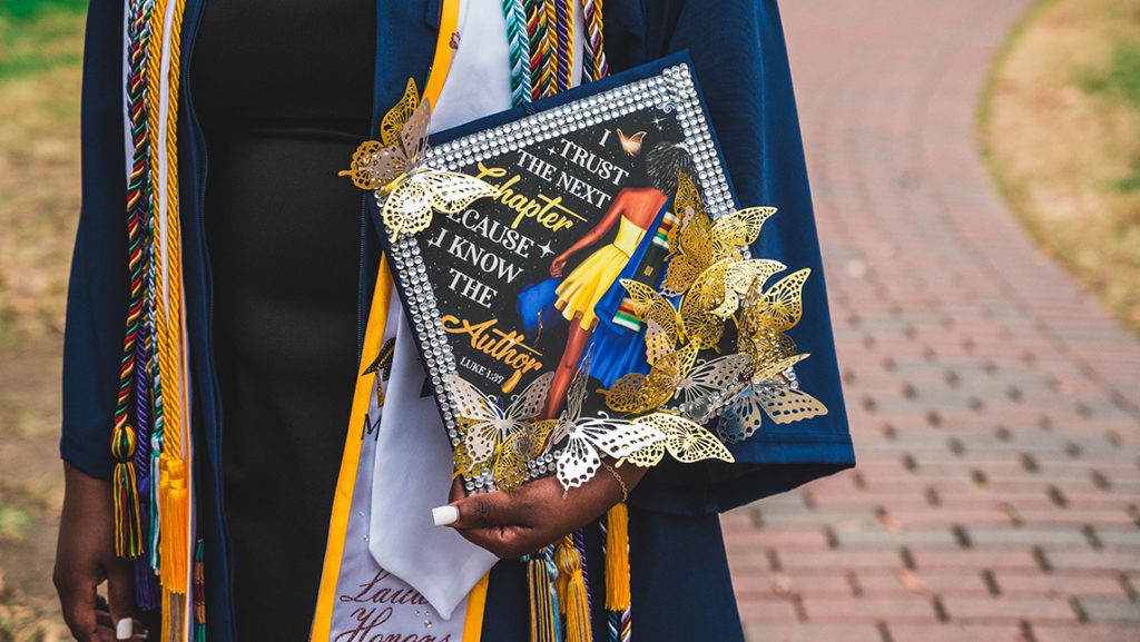 Decorated UNCG graduation cap.