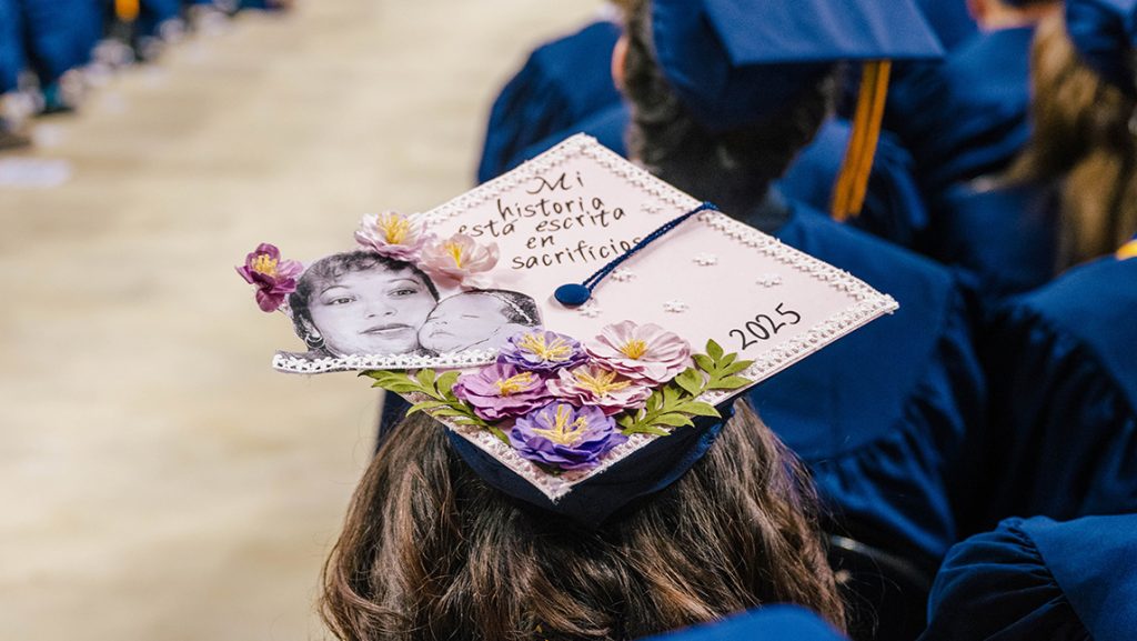 Decorated UNCG graduation cap.