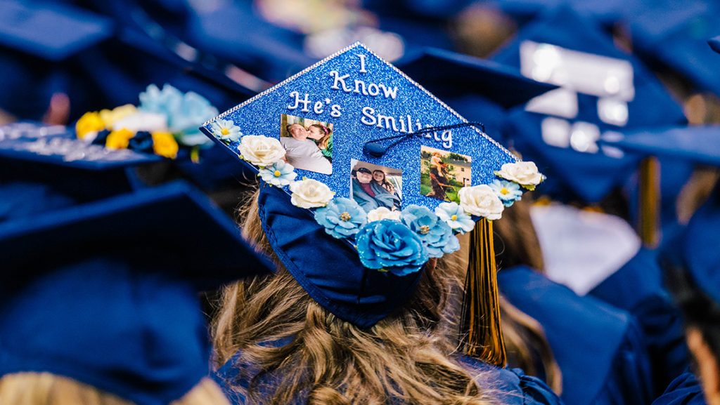 Decorated UNCG graduation cap.