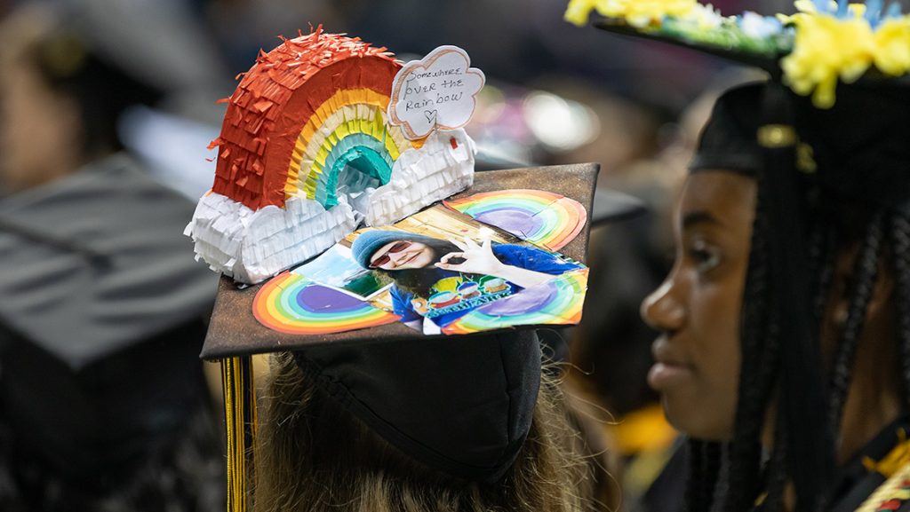 Decorated UNCG graduation cap.