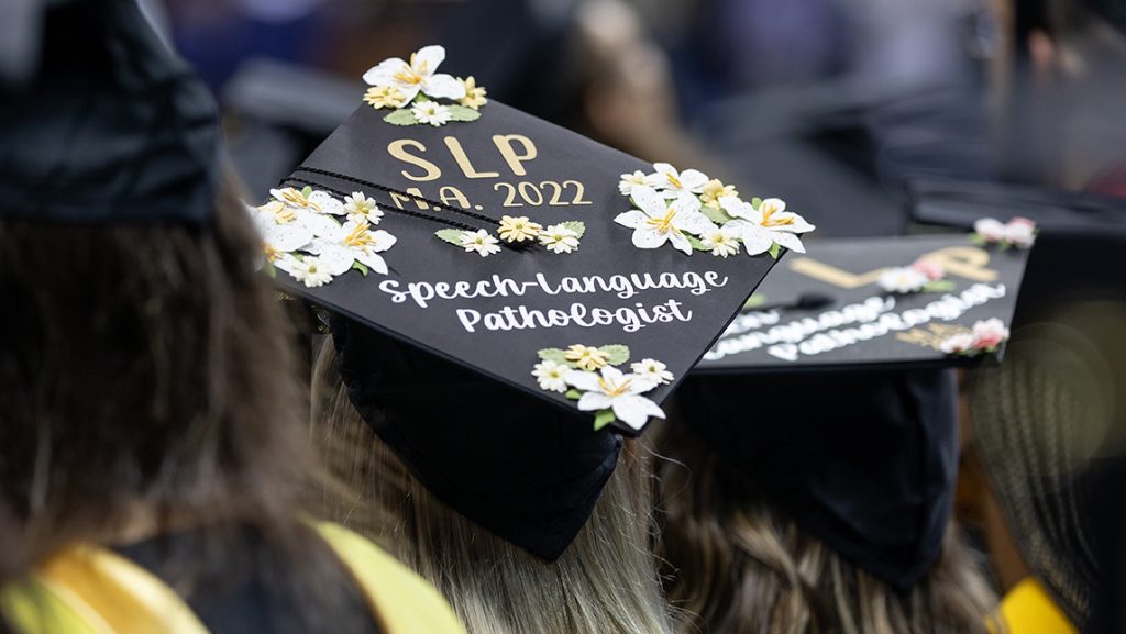 Decorated UNCG graduation cap.