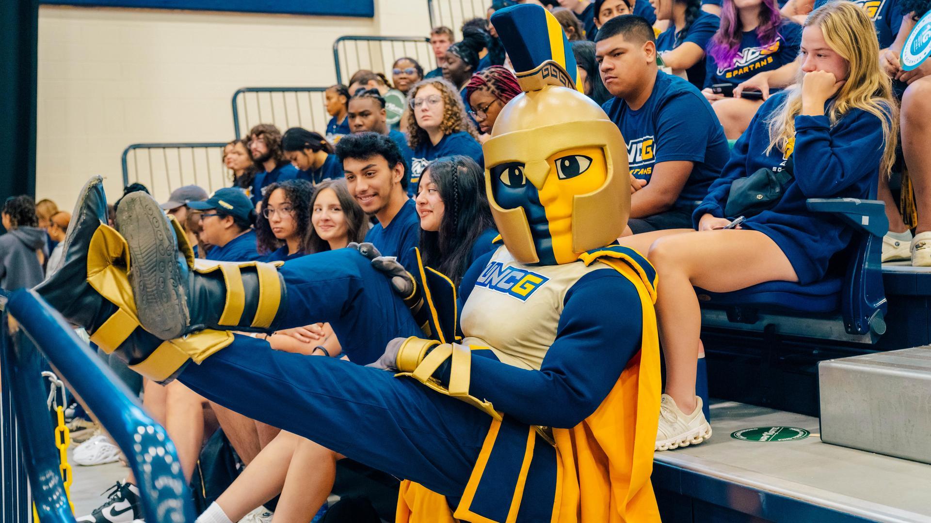 Spiro relaxing in the stands with fans