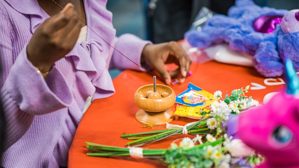 UNCG students work on Valentine's Day-themed crafts.