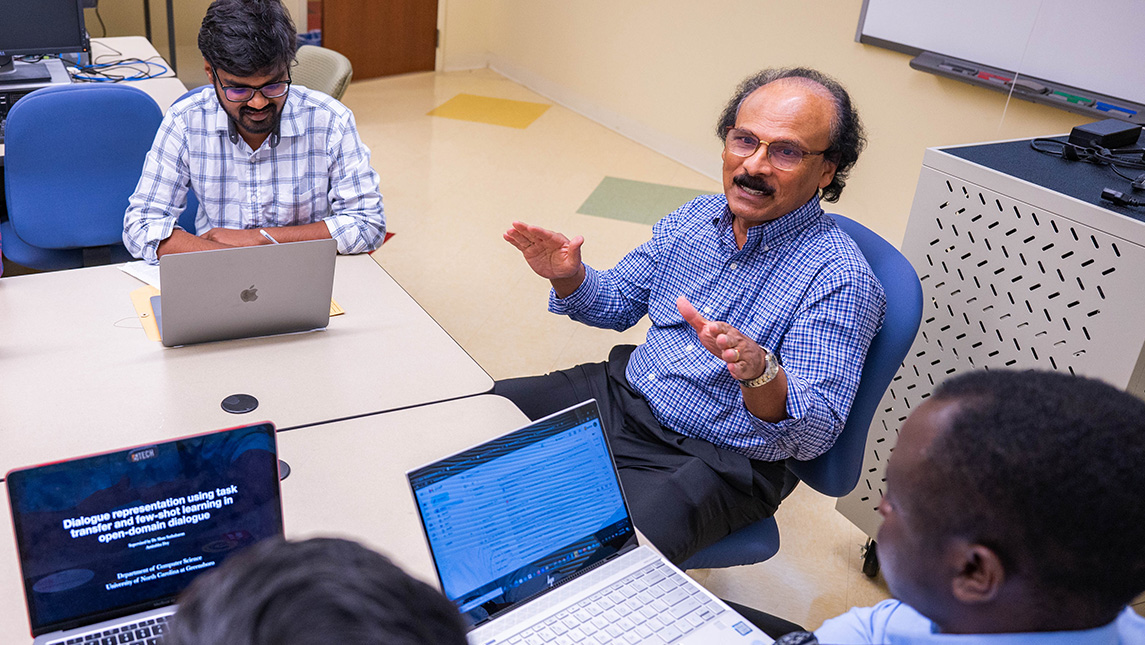 UNCG Professor Shan Suthaharan speaks to computer science students.