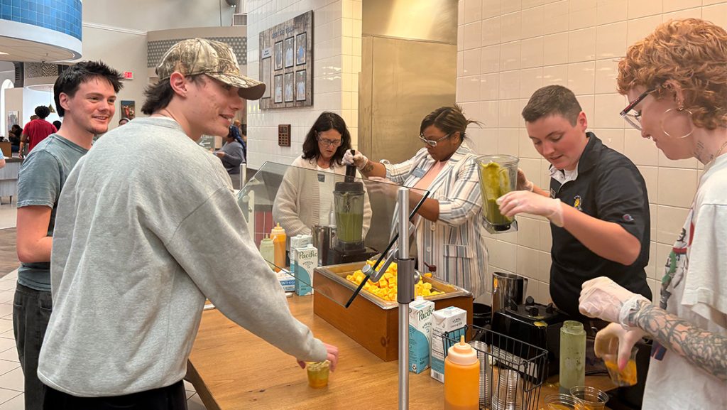 UNCG dining staff making smoothies.